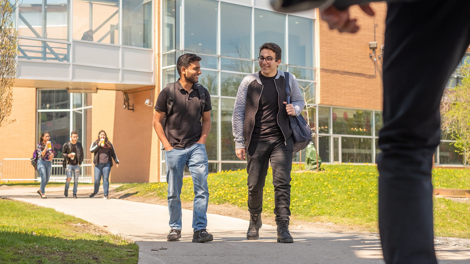 Students walking outside on campus