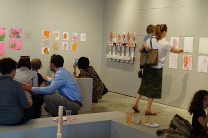Parents and children look at the Child Care Centre exhibition
