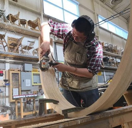 Samson working on the headrest for the chair