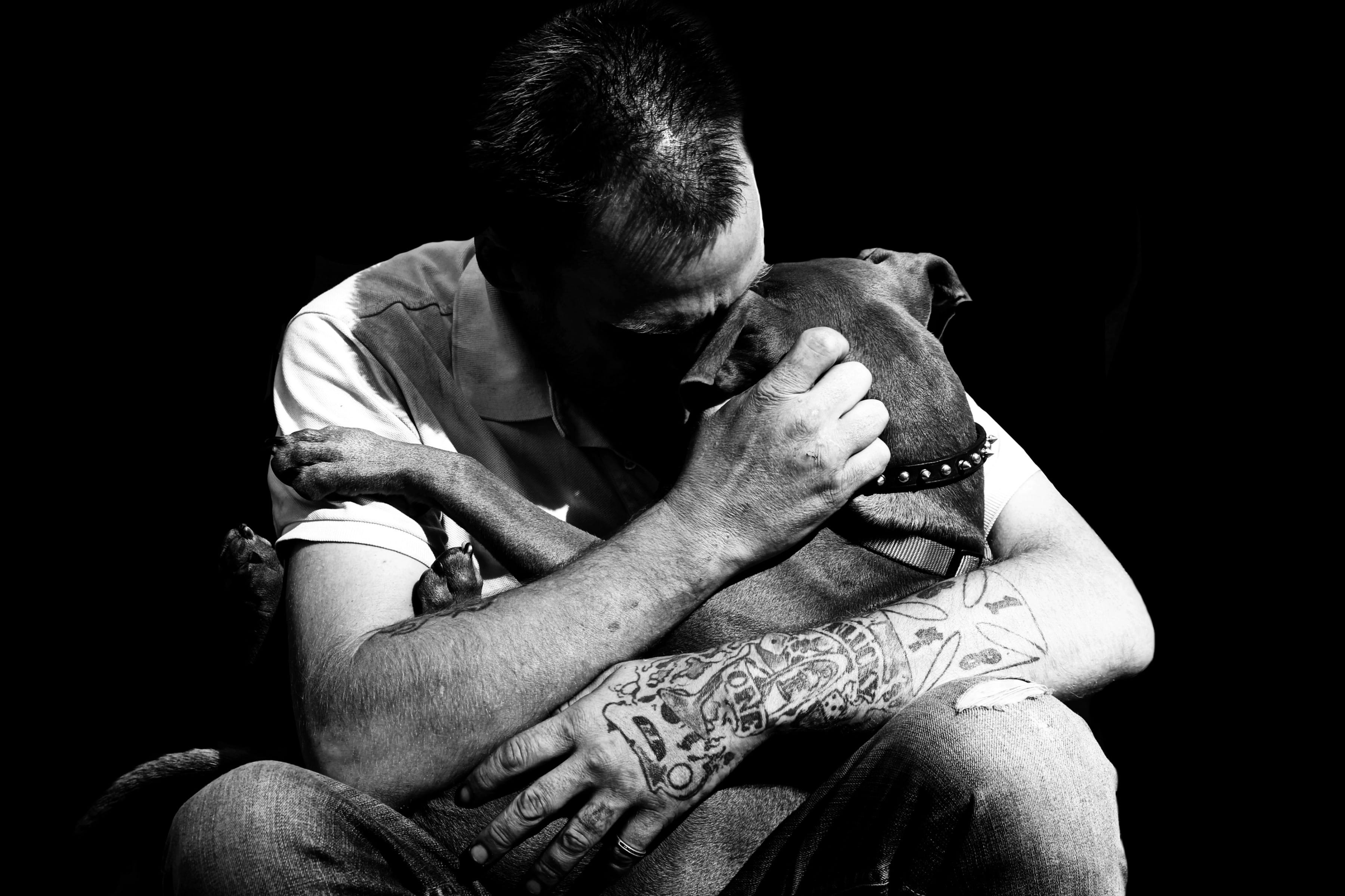 “Homeless Man and Dog” photo by Leah den Bok. 