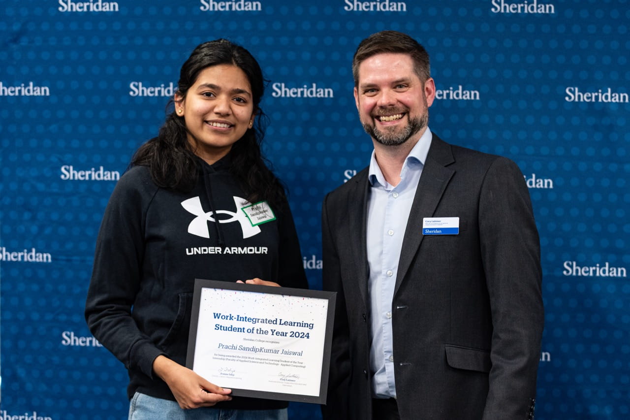 Award recipient Prachi Jaiswal is pictured with Sheridan Cooperative Education and Internship Associate Director Cory Latimer