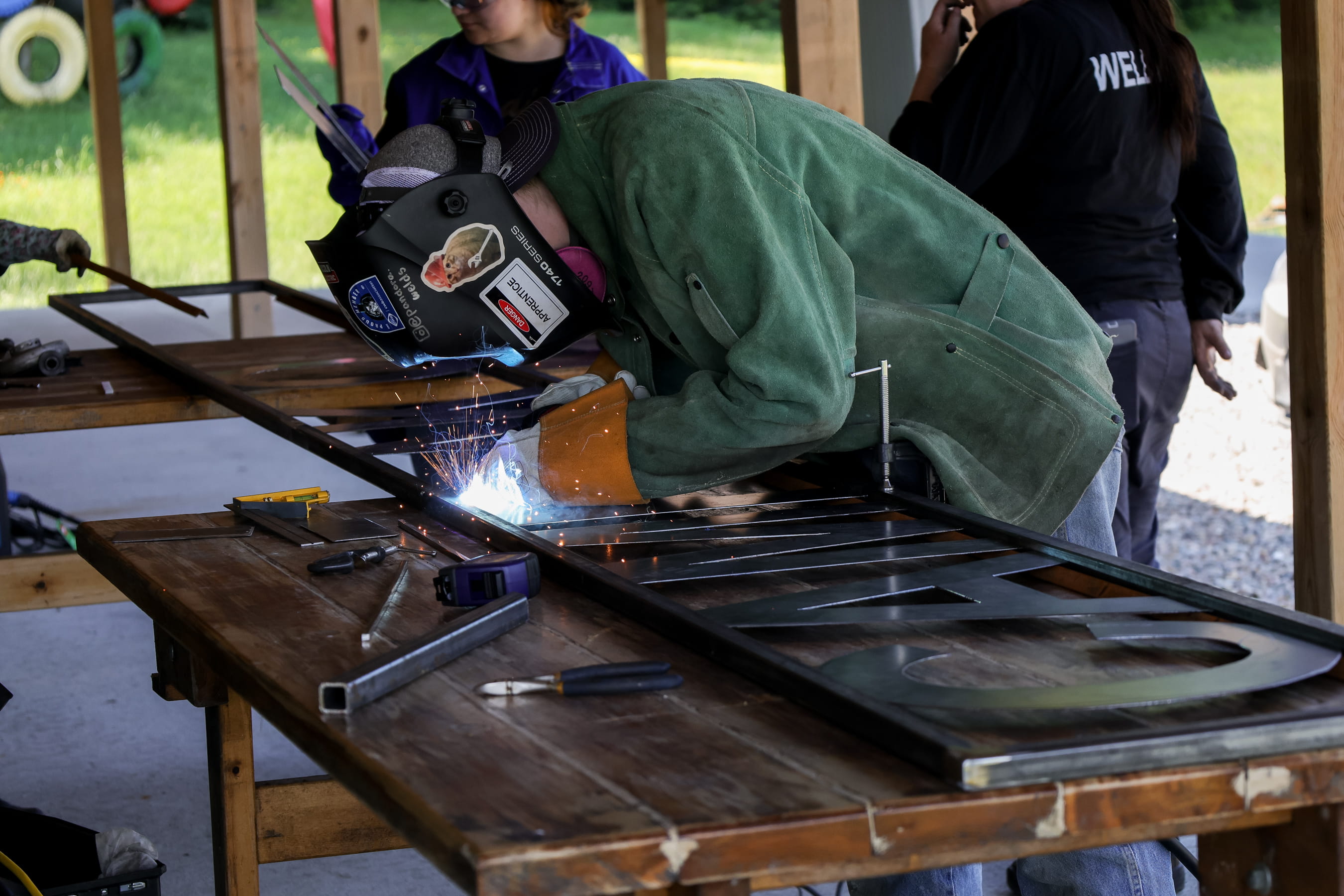 Header-working on sign