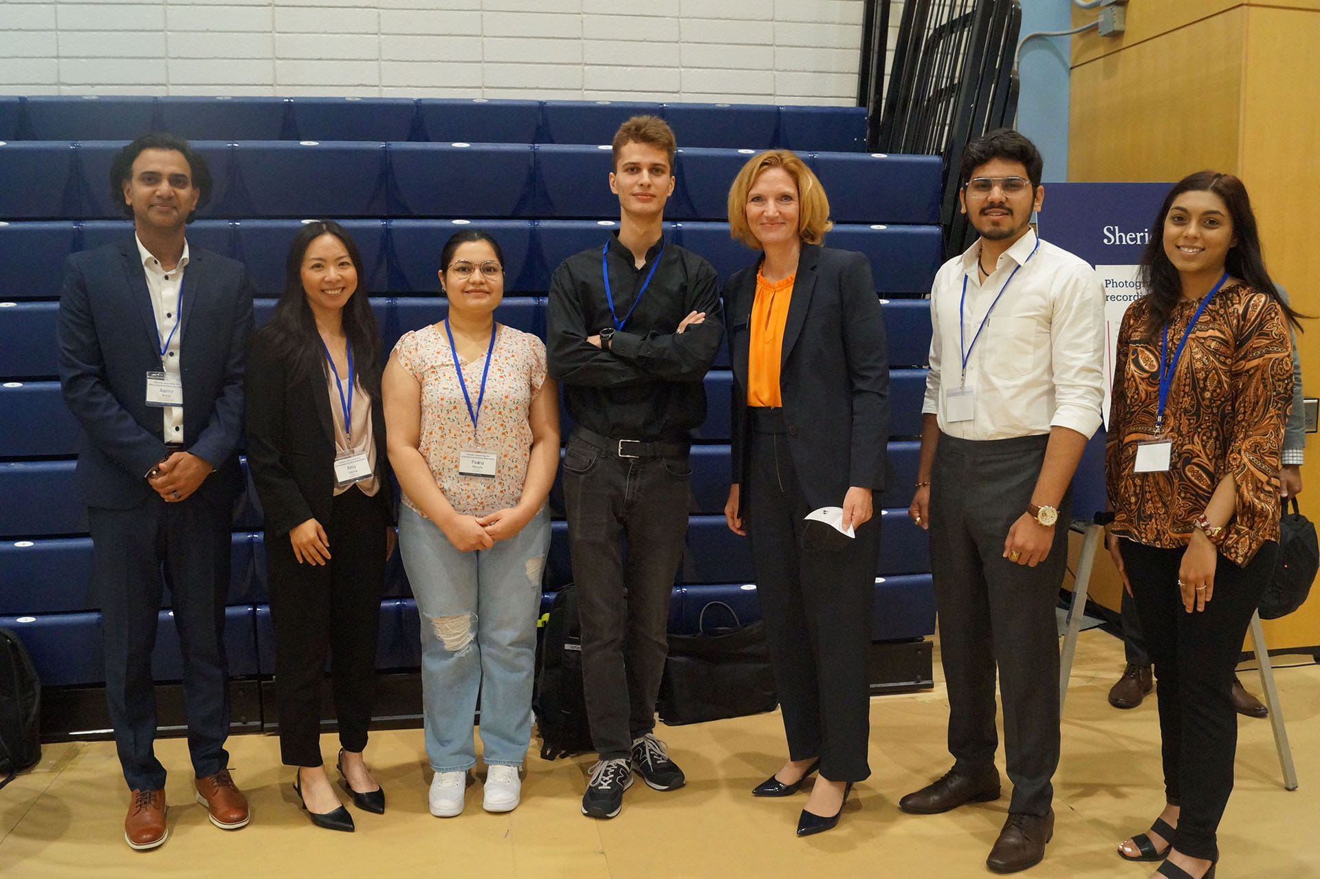Panel of international students pose side-by-side with Sheridan President and Vice Chancellor, Dr. Janet Morrison.