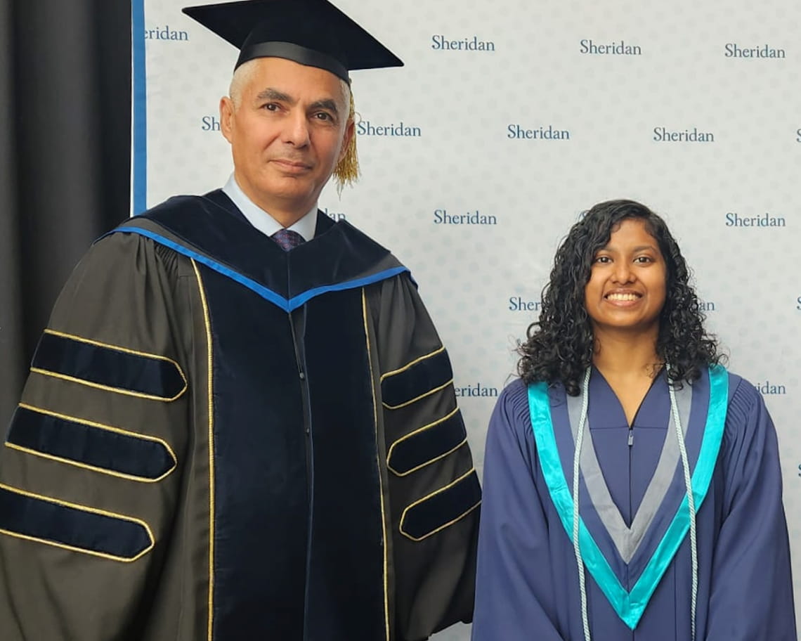 PSB Dean Muthana Zouri and valedictorian Jerlin Thomas