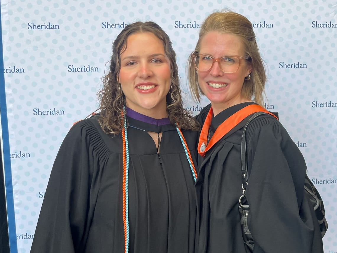 FAAD valedictorian Maia Azevedo and a faculty member