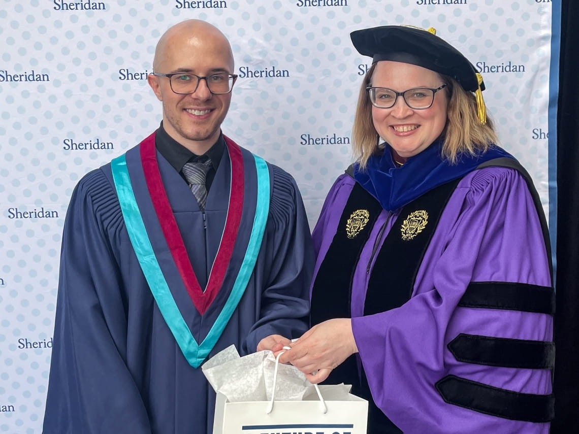 FAST valedictorian Ryley Mccafferty and Dean Elizabeth Fabbroni