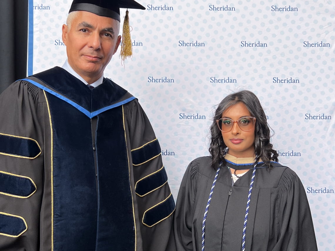 PSB Dean Muthana Zouri and valedictorian Sarah Rahim