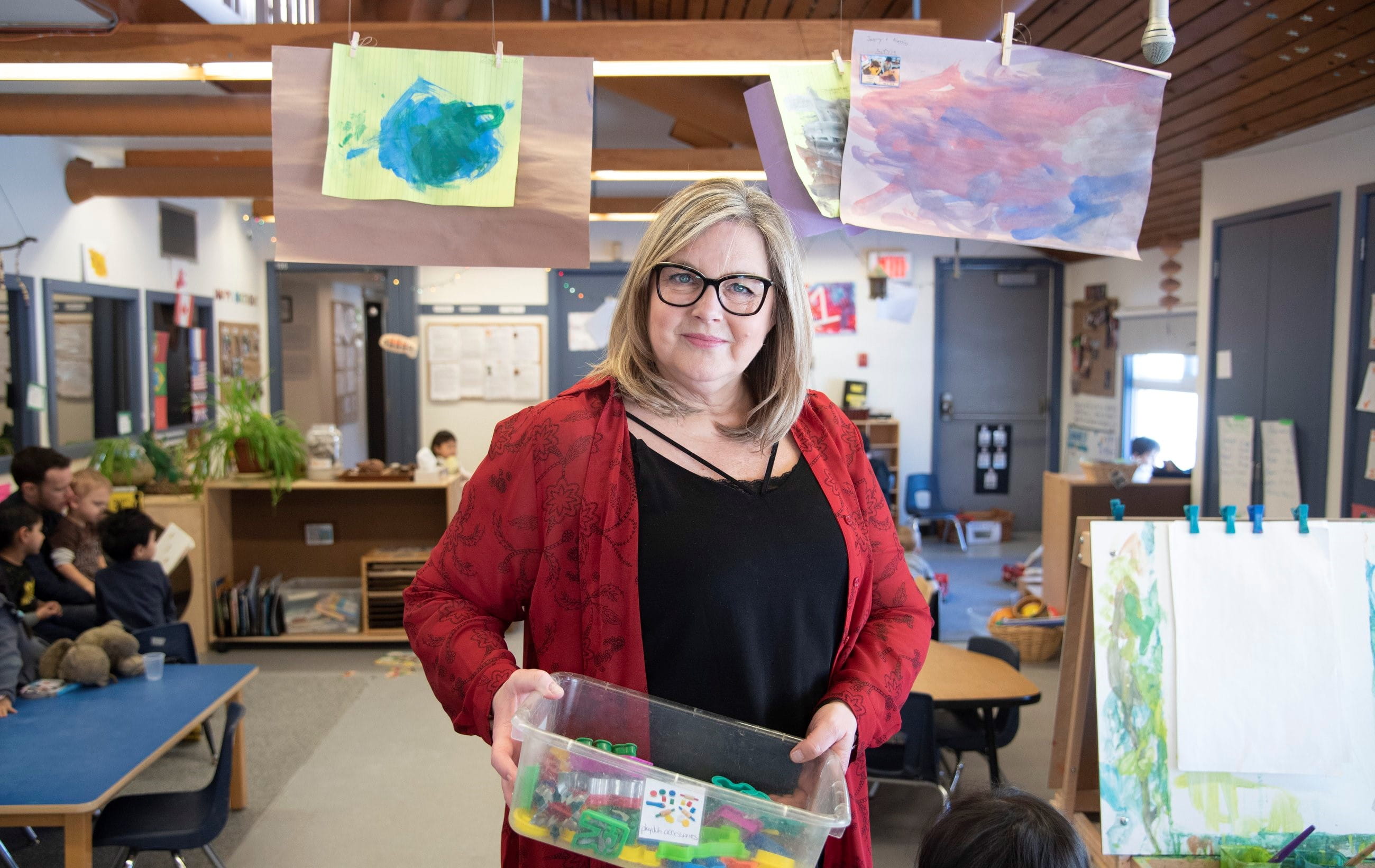 Monica Lysack standing in an early childhood education classroom