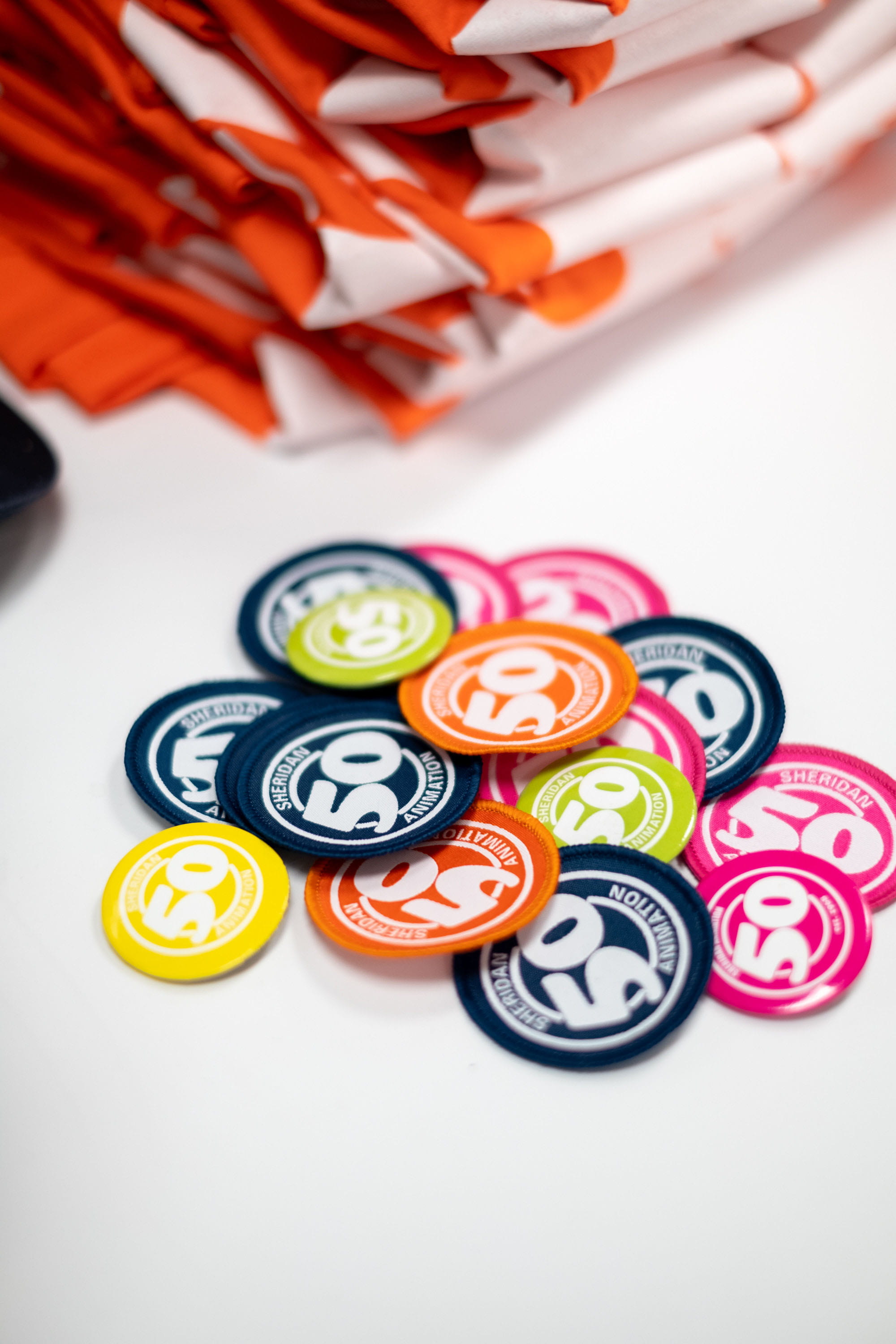 Colourful Animation 50 buttons on a white table