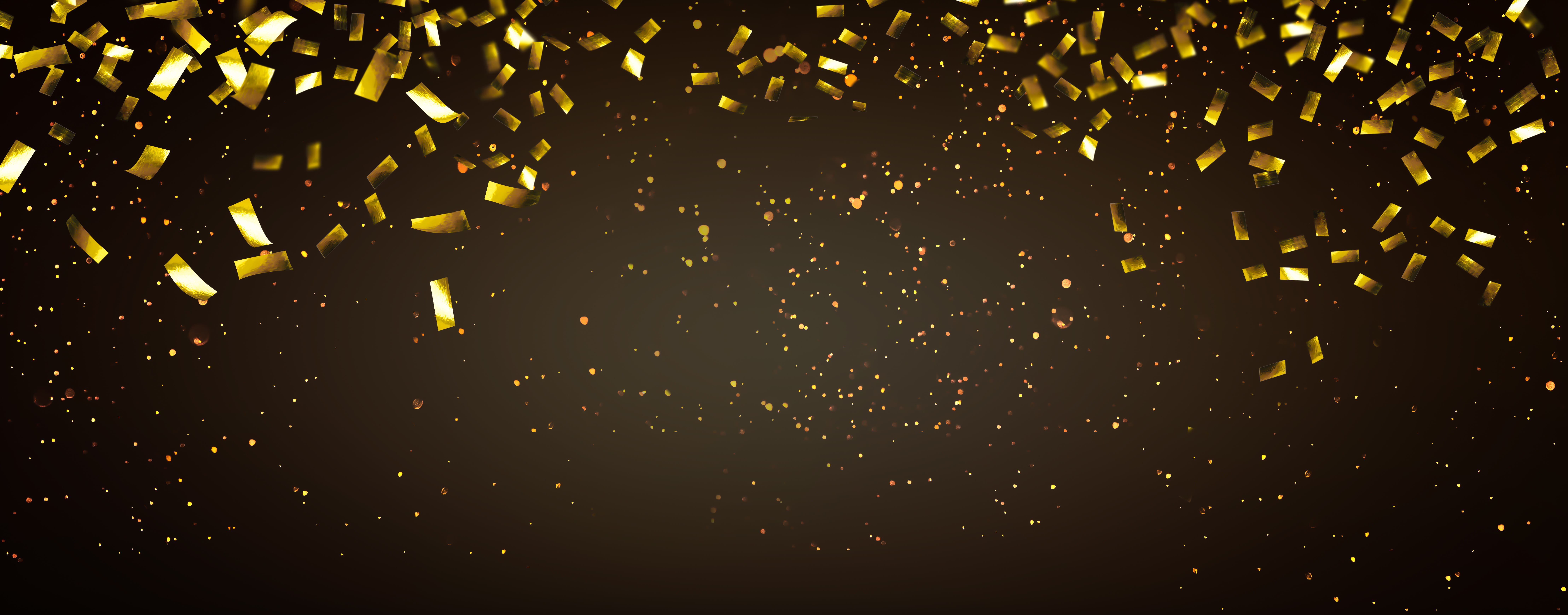 gold-coloured confetti falls to the ground to symbolize a victory celebration