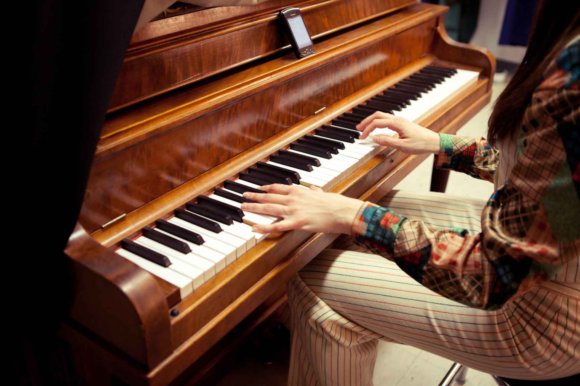 A student playing the piano
